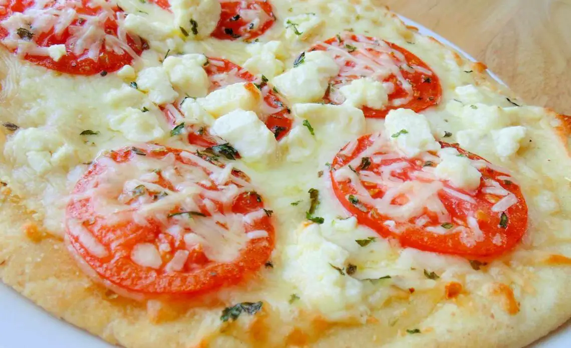 This Four Cheese Margherita Pizza is a wonderful twist on a beloved classic. The blend of cheeses adds depth and richness, making each bite a delightful experience.