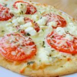 This Four Cheese Margherita Pizza is a wonderful twist on a beloved classic. The blend of cheeses adds depth and richness, making each bite a delightful experience.